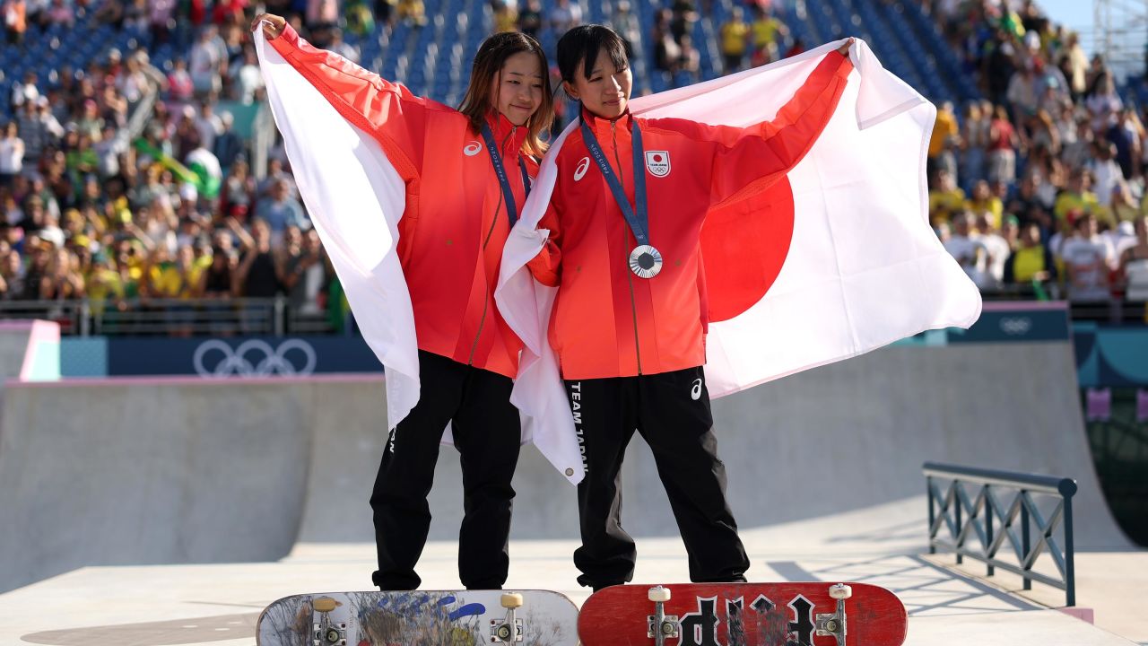 PARIS, FRANCE - JULY 28: Gold medalist Coco Yoshizawa of Team Japan (L) and Silver medalist Liz Akama of Team Japan (R) pose on the podium during the Women's Street Final on day two of the Olympic Games Paris 2024 at Place de la Concorde on July 28, 2024 in Paris, France. (Photo by Julian Finney/Getty Images)