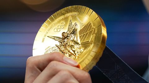 Olympics, Paris 2024, 100 m freestyle, men, final, first-placed Pan Zhanle from China shows his gold medal, in Paris, France on July 31, 2024.