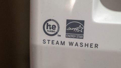 Close-up of logos for Energy Star program and High-Efficiency appliance designation on a steam washer in Oahu, Hawaii, July 23, 2024. (Photo by Smith Collection/Gado/Getty Images)
