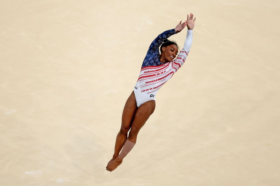 Biles competes on floor during the women's team final.