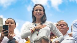 CARACAS, VENEZUELA - JULY 30: Opposition leader Maria Corina Machado looks on with a hand in her chest during a protest against the result of the presidential election on July 30, 2024 in Caracas, Venezuela. President of Venezuela Nicolas Maduro was declared as the winner of the 2024 presidential election over his rival, Edmundo Gonzalez. The result has been questioned by the opposition and internationally. According to the opposition leader Maria Corina Machado, the result announced by the 'Consejo Nacional Electoral' (CNE) does not reflect the decision made by the Venezuelans during the election. (Photo by Alfredo Lasry R/Getty Images)