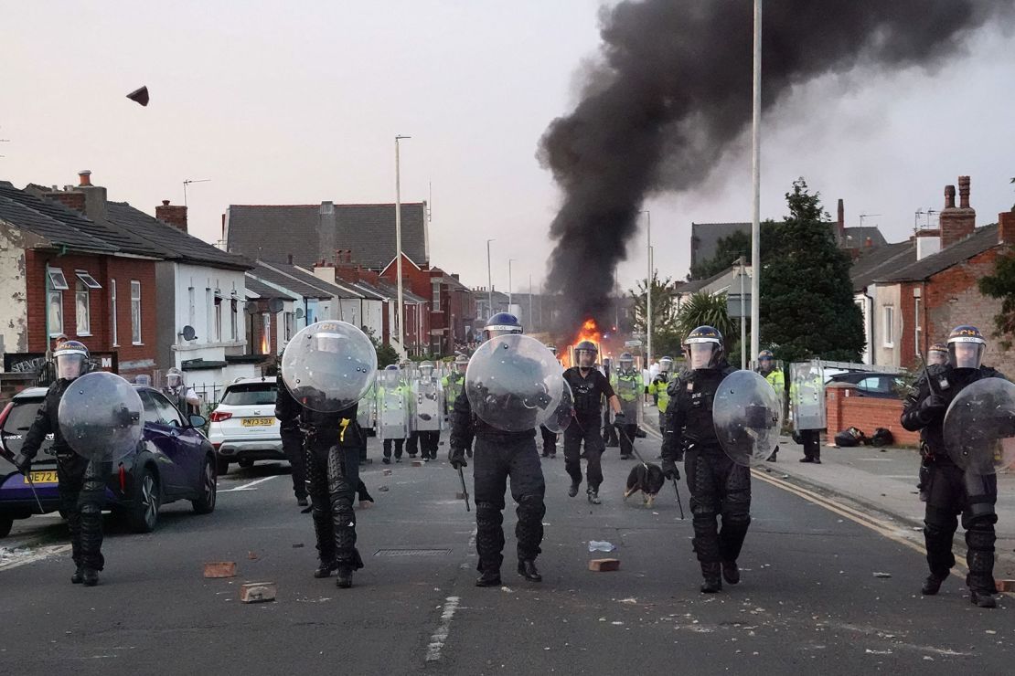 Southport stabbing: Riot police, protesters clash during vigil for ...