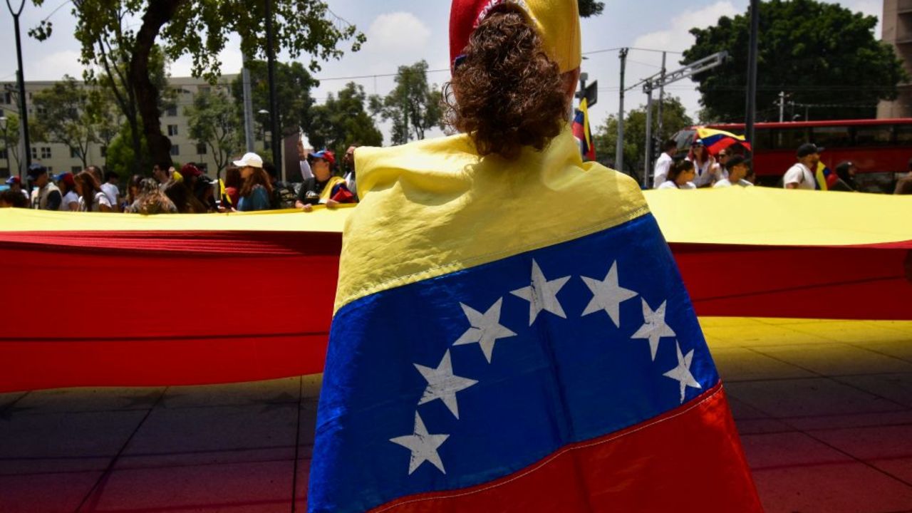 Members of the Venezuelan community in Mexico protest against the results of Venezuela's presidential elections in front of the Simon Bolivar monument in Mexico City on August 3, 2024. (Photo by Haaron ALVAREZ / AFP) (Photo by HAARON ALVAREZ/AFP via Getty Images)