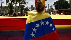 Members of the Venezuelan community in Mexico protest against the results of Venezuela's presidential elections in front of the Simon Bolivar monument in Mexico City on August 3, 2024. (Photo by Haaron ALVAREZ / AFP) (Photo by HAARON ALVAREZ/AFP via Getty Images)