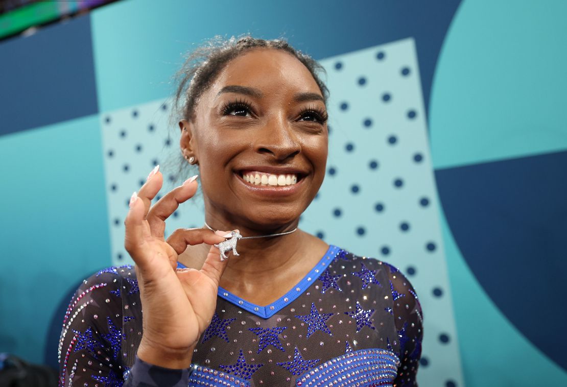 “If it goes well, I’ll wear the goat necklace,” Biles said in a press conference after her sixth gold medal win. “I know people will go crazy over it. But at the end of the day, it is crazy that I am in the conversation of greatest of all athletes because I just still think I’m Simone Biles from Spring, Texas that loves to flip.”