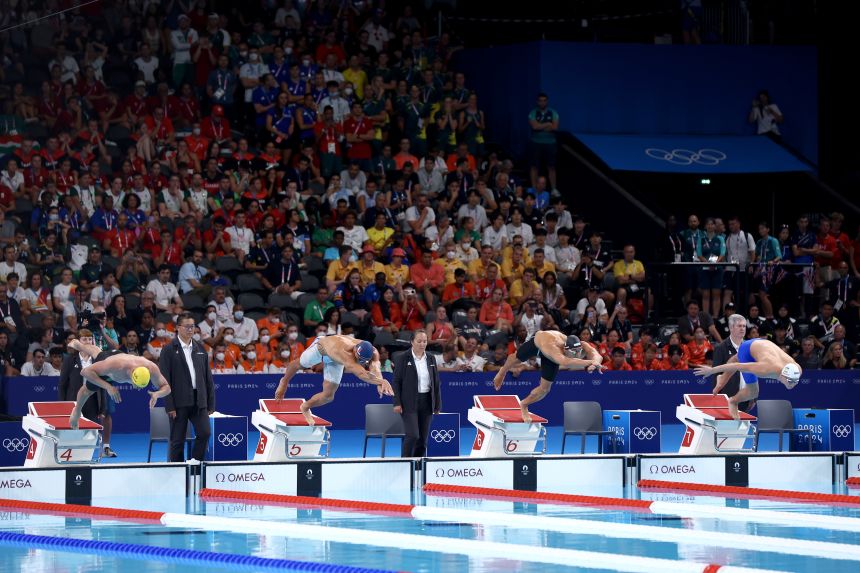 Bukhov (rightmost) competing in the 50m freestyle semifinals at the Paris Olympic Games on August 1, 2024 in Nanterre.
