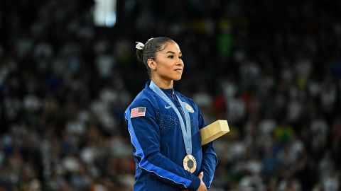 Bronze medallist US' Jordan Chiles poses during the podium ceremony for the artistic gymnastics women's floor exercise event of the Paris 2024 Olympic Games at the Bercy Arena in Paris, on August 5, 2024.