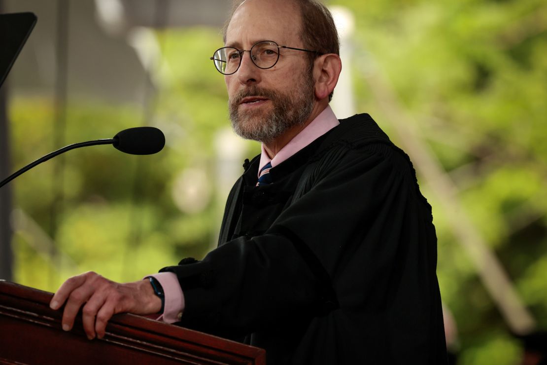 Harvard President Alan Garber addresses a commencement crowd on May 23, 2024, during his interim presidency.