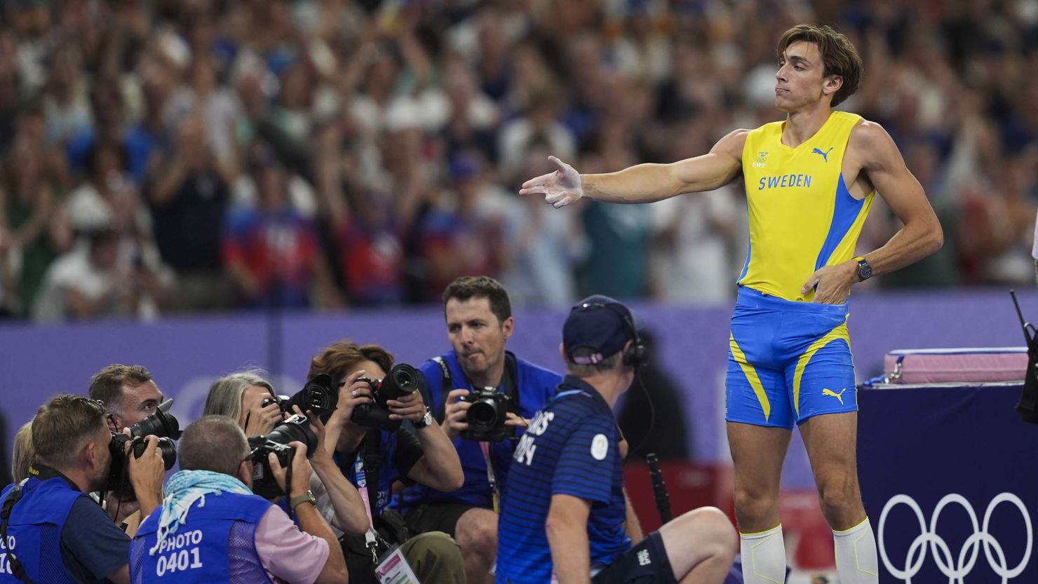 Sweden's Armand Duplantis celebrates his victory with the new celebration sweeping the Games.