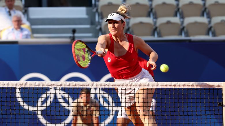PARIS, FRANCE - AUGUST 02: Gabriela Dabrowski of Team Canada plays a forehand as she plays with Felix Auger-Aliassime of Team Canada during the Tennis Mixed Doubles Bronze Medal match against Demi Schuurs and Wesley Koolhof of Team Netherlands on day seven of the Olympic Games Paris 2024 at Roland Garros on August 02, 2024 in Paris, France. (Photo by Clive Brunskill/Getty Images)