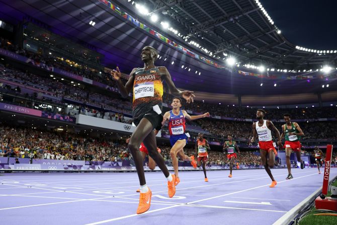 Uganda's Joshua Cheptegei <a href="https://www.cnn.com/sport/live-news/paris-olympics-news-2024-08-02-24#h_b7f0c1015ff653d4d8e35321da92dec1">wins the 10,000 meters</a> on August 2. He set an Olympic record (26:43.14) on his way to the gold medal.