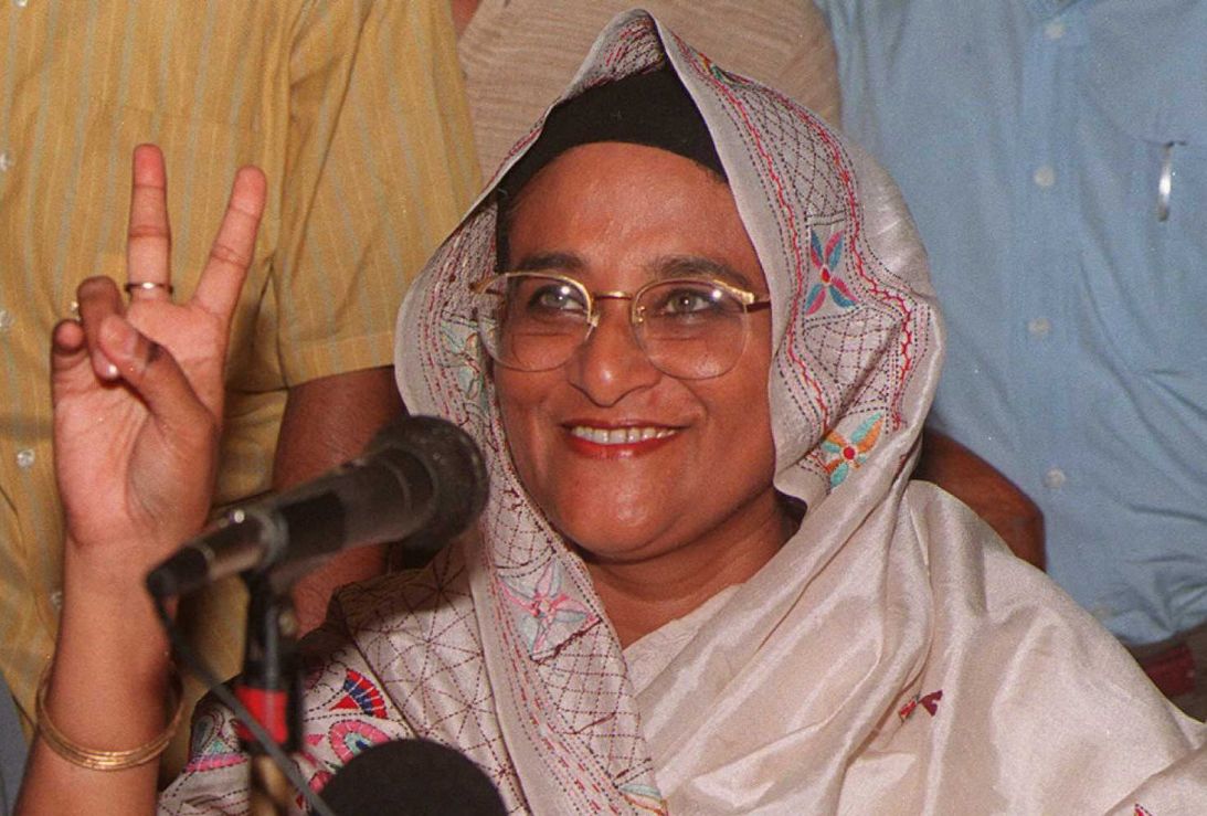 Sheikh Hasina flashes a victory sign in Dhaka in June, 1996.