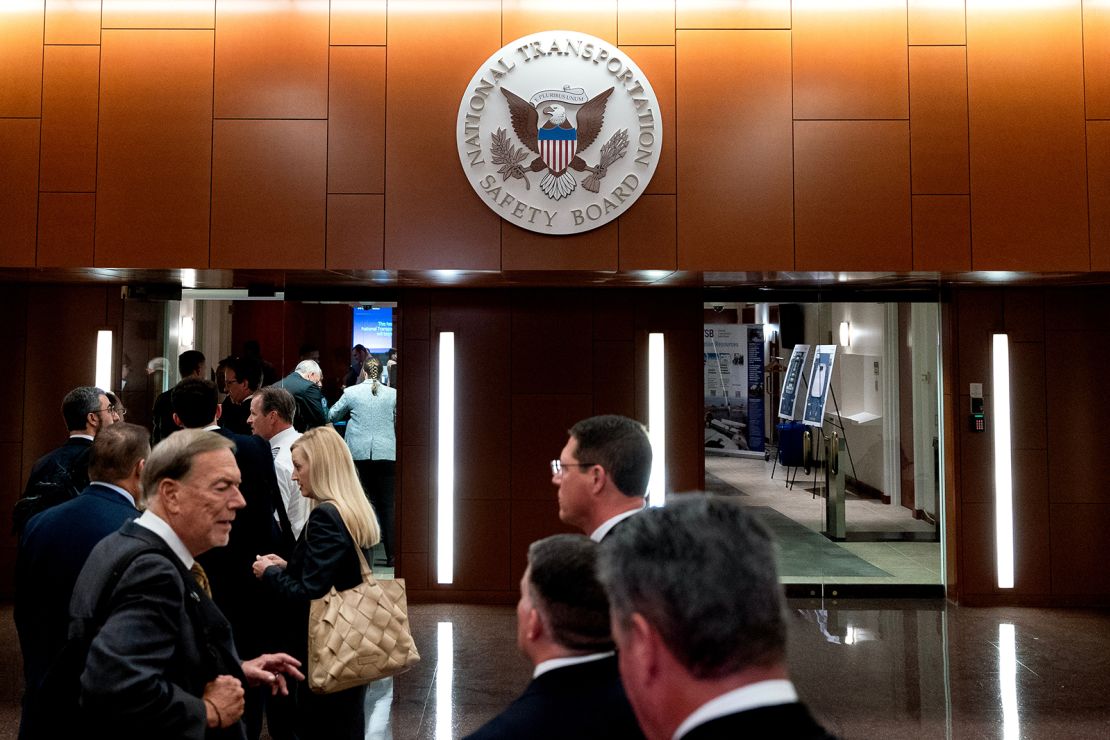 Attendees arrive for an investigative hearing by the National Transportation Safety Board in Washington, DC, on Tuesday, August 6, 2024.