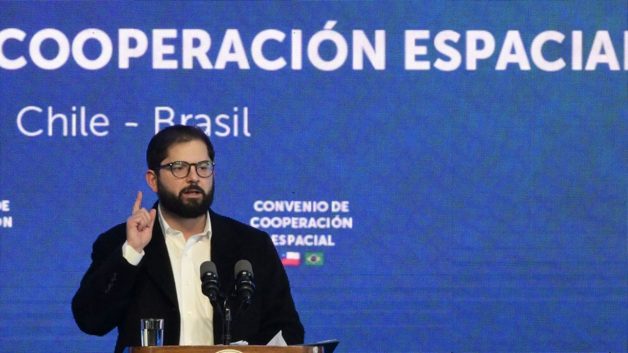 Chile's President Gabriel Boric speaks during the signing of the Space Cooperation Agreement with Brazil's President Luiz Inacio Lula Da Silva (out of frame) at the Aeronautical and Space Museum in Santiago on August 6, 2024. Lula Da Silva is on official visit to Chile to discuss economic issues and bilateral relations. (Photo by RODRIGO ARANGUA / AFP) (Photo by RODRIGO ARANGUA/AFP via Getty Images)