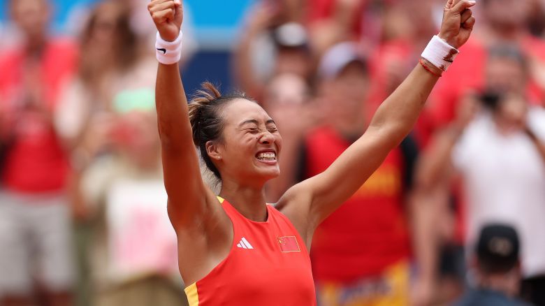 Zheng Qinwen of Team People’s Republic of China celebrates match point during the Tennis Women's Singles Gold Medal match against Donna Vekic of Team Croatia on day eight of the Olympic Games Paris 2024 at Roland Garros on August 03, 2024 in Paris, France.