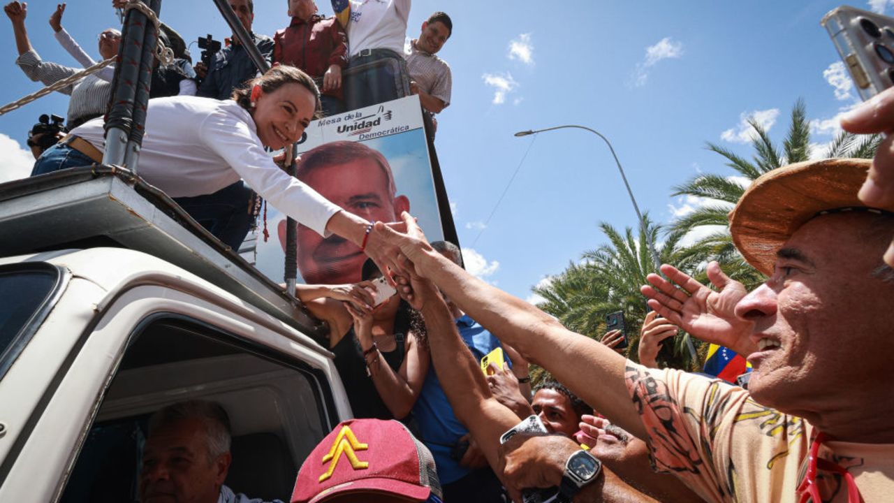 CARACAS, VENEZUELA - AUGUST 3: Opposition leader Maria Corina Machado, greets supporters during 'Ganó Venezuela' opposition protest on August 3, 2024 in Caracas, Venezuela. President of Venezuela Nicolas Maduro was declared as the winner of the 2024 presidential election over his rival, Edmundo Gonzalez. The result has been questioned by the opposition and internationally. According to the opposition leader Maria Corina Machado, the result announced by the 'Consejo Nacional Electoral' (CNE) does not reflect the decision made by the Venezuelans during the election. (Photo by Jesus Vargas/Getty Images)