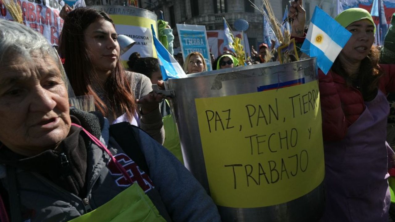 Demonstrators arrive at Plaza de Mayo Square from the San Cayetano Church during a march against Argentine President Javier Milei's government in Buenos Aires on August 7, 2024. Every year on its day, San Cayetano, the patron saint of work and bread, attracks thousands of faithful Catholics looking for employment. (Photo by JUAN MABROMATA / AFP) (Photo by JUAN MABROMATA/AFP via Getty Images)