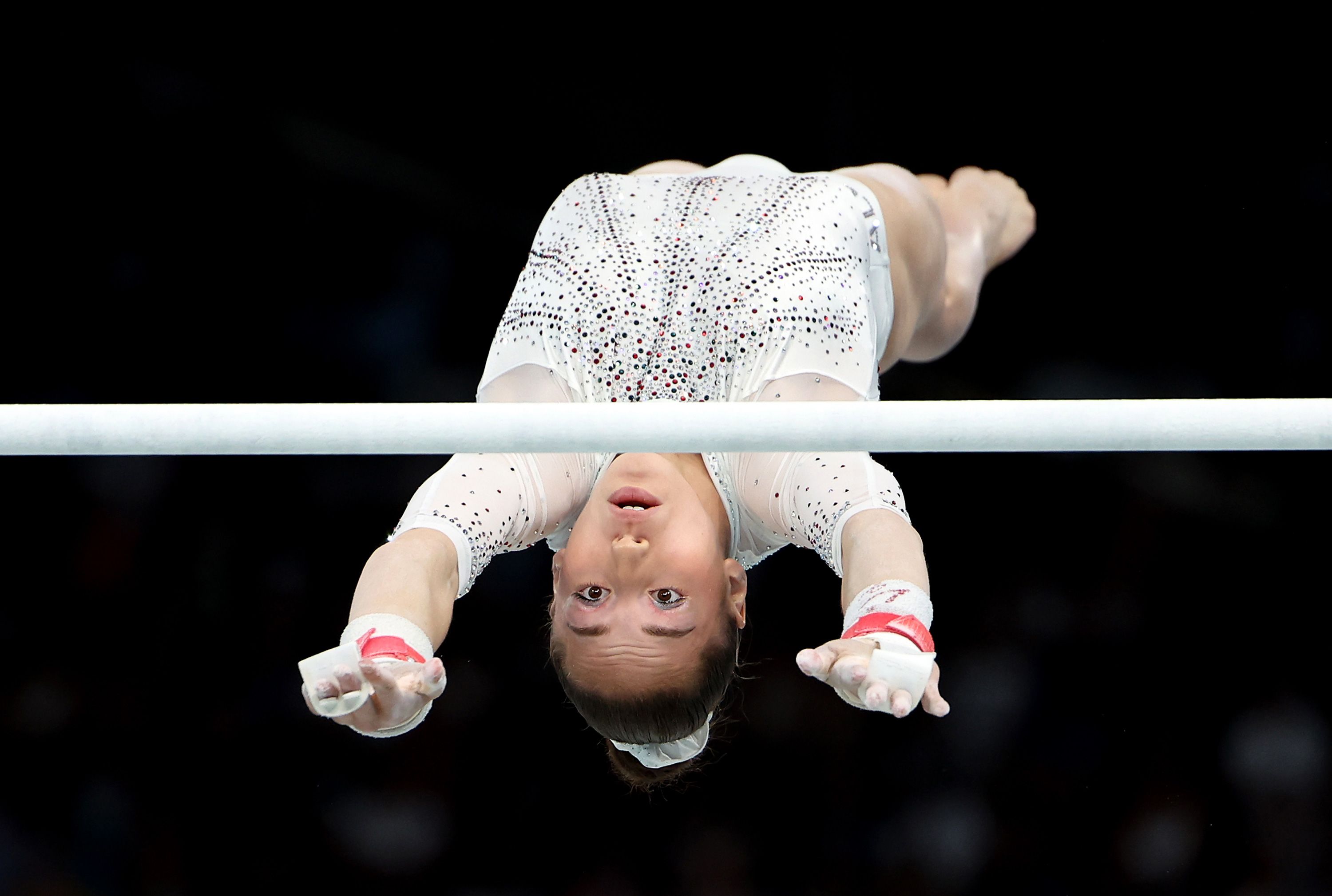 Algeria’s Kaylia Nemour competes in the uneven bars final on August 4. She <a href="https://www.cnn.com/sport/live-news/paris-olympics-news-2024-08-04#h_486ddbefb00d76a8963f75a064f4ed2d">made history</a> by winning her country's first gold medal in the sport.