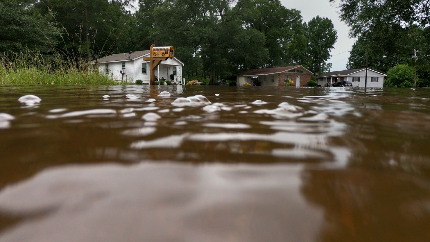 Homes in the Allen Circle neighborhood of Statesboro, Georgia, on August 7 flooded after Tropical Storm Debby caused water levels to rise. It also caused flooding and power outages throughout the region.