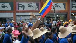 Supporters of Venezuelan President Nicolas Maduro participate in a march heading to Miraflores presidential palace in support of the presidential election results in Caracas on August 7, 2024.  (Photo by YURI CORTEZ / AFP) (Photo by YURI CORTEZ/AFP via Getty Images)