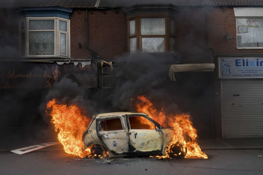 A car burns on Parliament Road in Middlesborough after it was set alight by far-right activists last weekend.