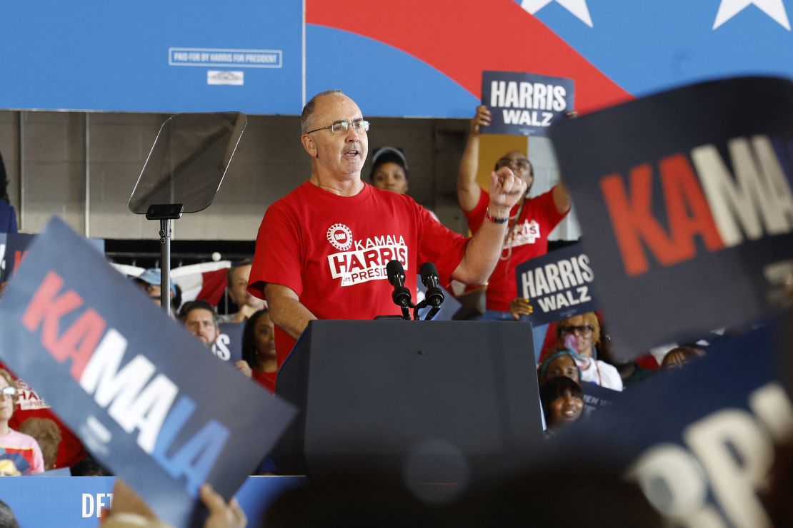 United Auto Workers President Shawn Fain speaks during a Harris campaign rally at Detroit Metropolitan Airport in August.