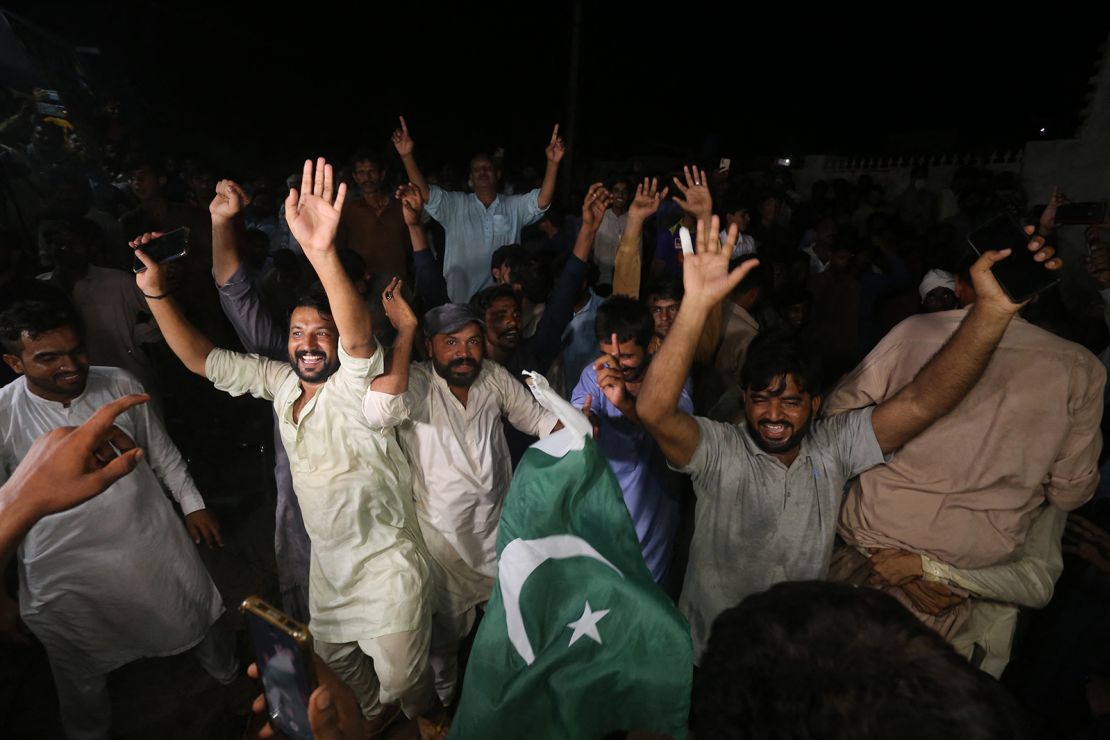 Supporters and family members of Pakistani athlete Arshad Nadeem celebrate after his Olympic victory at Mian Channu in Khanewal district, Pakistan on August 9, 2024.