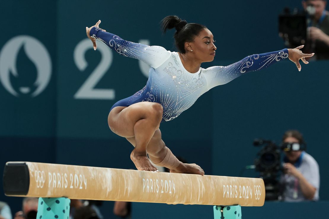 Simone Biles competes during the artistic gymnastics women's balance beam final on August 5, 2024 in Paris.