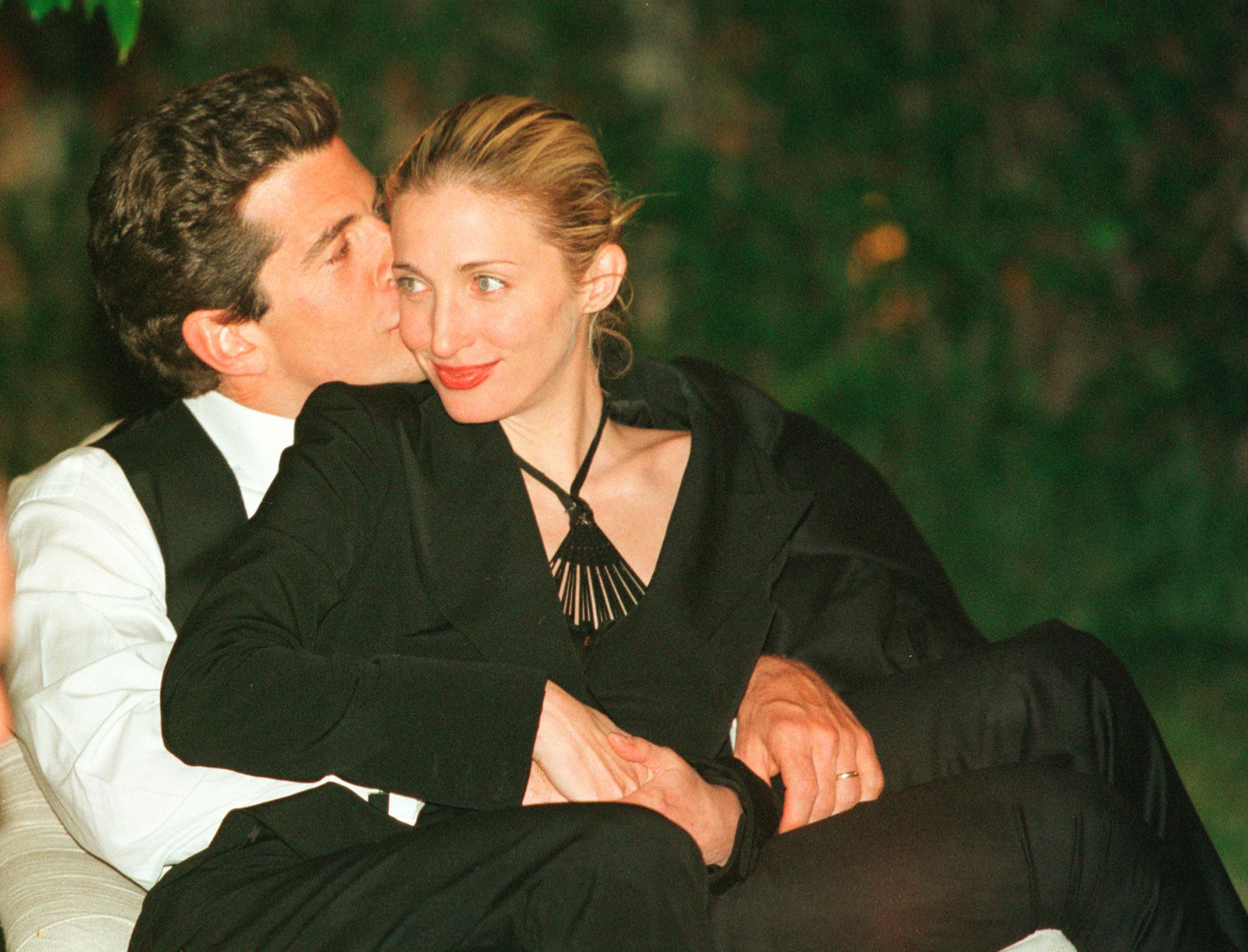 John F. Kennedy, Jr. and Carolyn Bessette Kennedy at the annual White House Correspondents dinner in May 1999. Carolyn's enduring style is celebrated in a new book.
