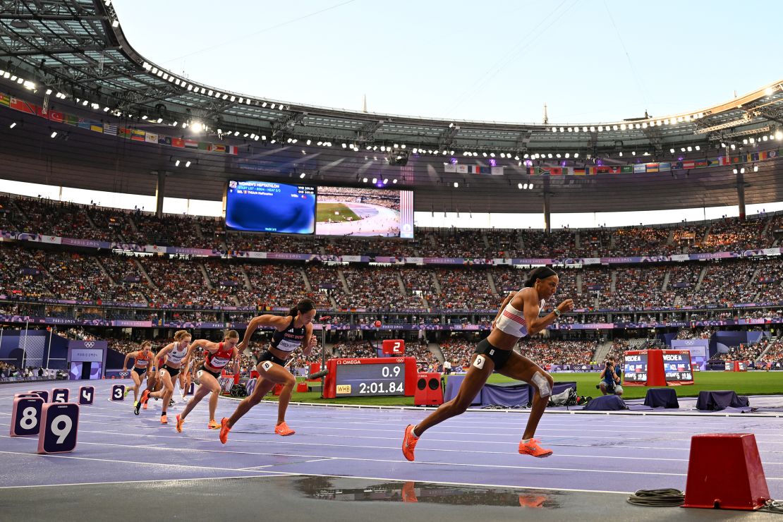 Thiam (R) during the 800-meter run in the heptathlon on August 9.