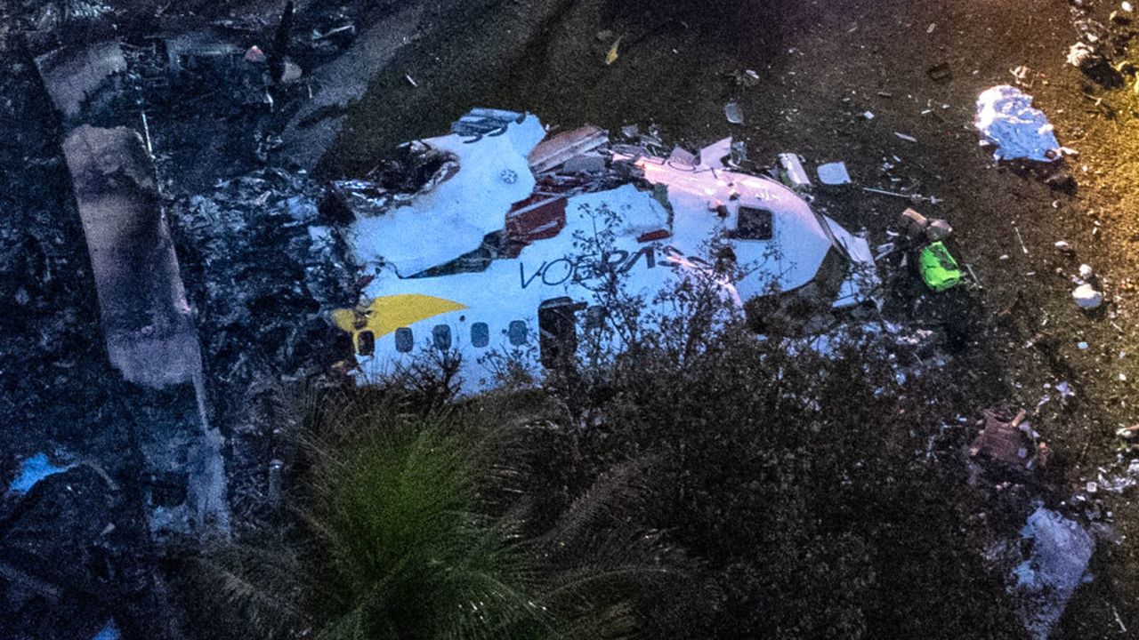 TOPSHOT - Aerial view of the wreckage of an airplane that crashed with 61 people on board in Vinhedo, Sao Paulo State, Brazil, on August 9, 2024. An airplane carrying 57 passengers and four crew crashed on August 9 in Brazil's Sao Paulo state, killing everyone on board, local officials said. The aircraft, a French-made ATR 72-500 operated by the airline Voepass, was travelling from Cascavel in southern Parana state to Sao Paulo's Guarulhos international airport when it crashed in the city of Vinhedo. (Photo by MIGUEL SCHINCARIOL / AFP) (Photo by MIGUEL SCHINCARIOL/AFP via Getty Images)