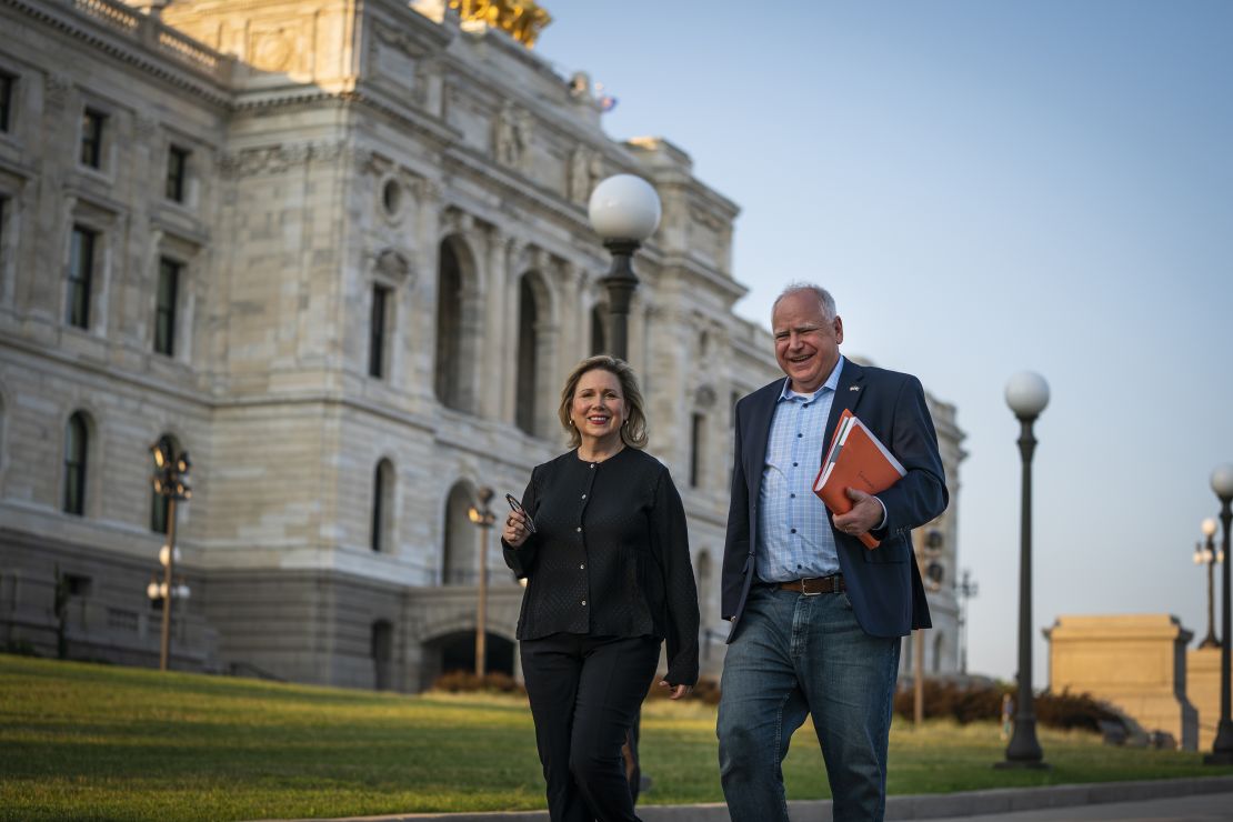 ST. PAUL, MN. - JUNE 2021: Minnesota DFL (Democratic-Farmer-Labor Party) Governor Tim Walz, with his wife Gwen Walz, walked the signed education budget law over to the office of Secretary of State Steve Simon from the State Capitol, Wednesday, June 30, 2021. (Photo by Leila Navidi/Star Tribune via Getty Images)