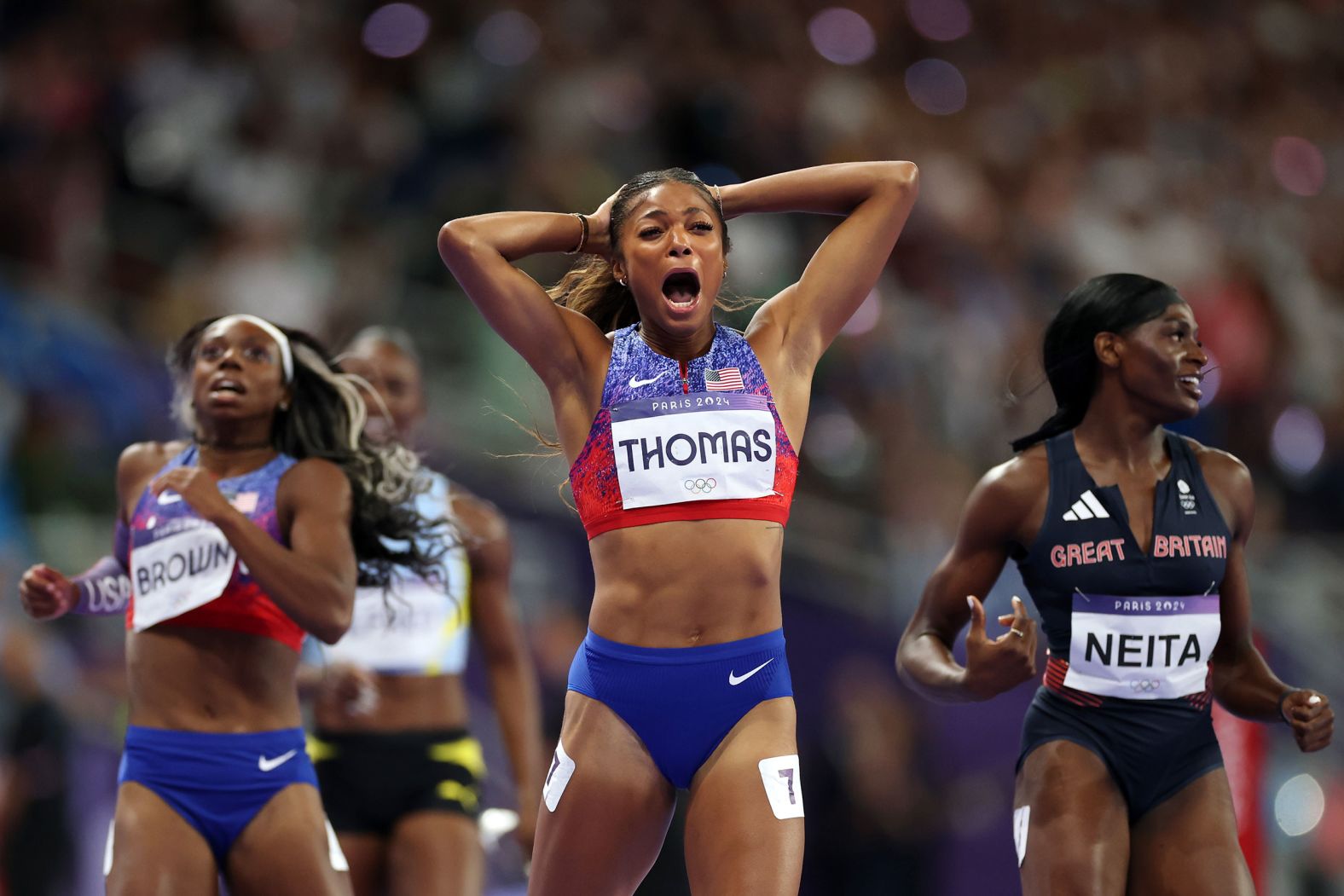 US sprinter Gabby Thomas celebrates after <a >winning the 200 meters</a> on August 6.