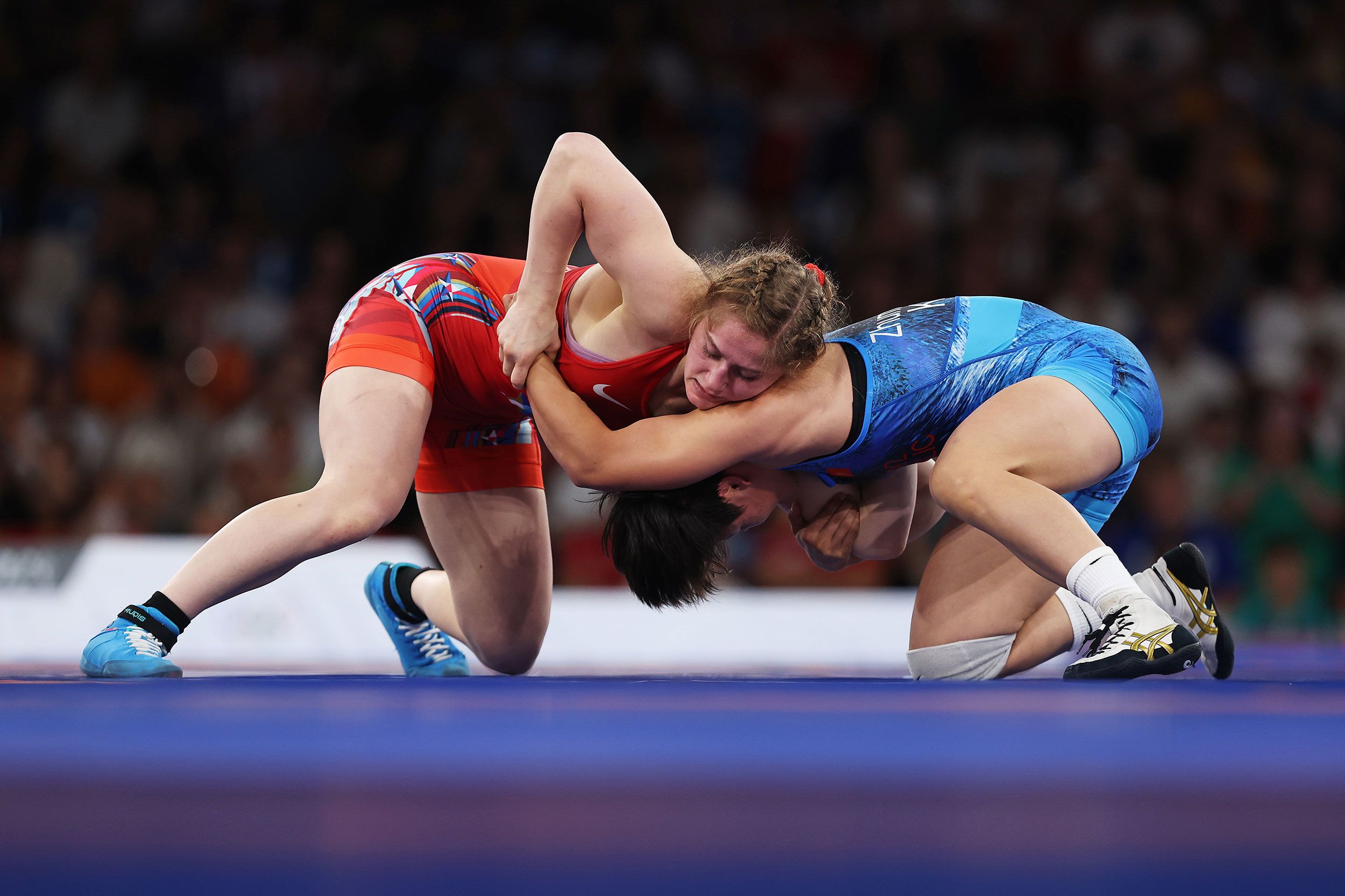 The United States' Amit Elor, left, wrestles Kyrgyzstan's Meerim Zhumanazarova in the 68-kilogram final on August 6. <a href="https://www.cnn.com/sport/live-news/paris-olympics-news-2024-08-06#h_aa31c5c75fce4cc3d925b9b65fdb2140">Elor won the gold medal</a>.