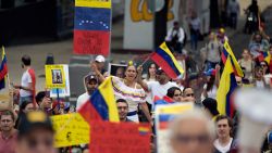 Members of the Venezuelan community in Mexico march during a protest against the result announced for the Venezuelan presidential election at the Monumento a la Revolucion in Mexico City on August 10, 2024. Opposition candidate Edmundo González Urrutia, rival of leftist President Nicolás Maduro in Venezuela's July 28 presidential elections, urged him on Saturday to stop "violence and persecution" against demonstrators who came out to protest amid allegations of fraud. (Photo by ALFREDO ESTRELLA / AFP) (Photo by ALFREDO ESTRELLA/AFP via Getty Images)