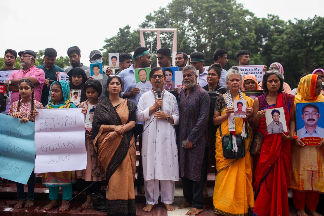 Family members of people "disappeared" campaign for their return outside the Shaheed Minar in Dhaka on 11 August 2024.