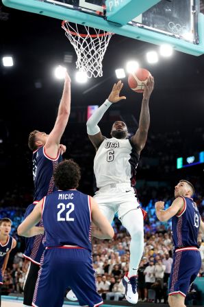 LeBron James rises for a layup during a semifinal game against Serbia on August 8. James and Team USA trailed by 13 at the end of the third quarter, but <a >they rallied to win 95-91</a>.