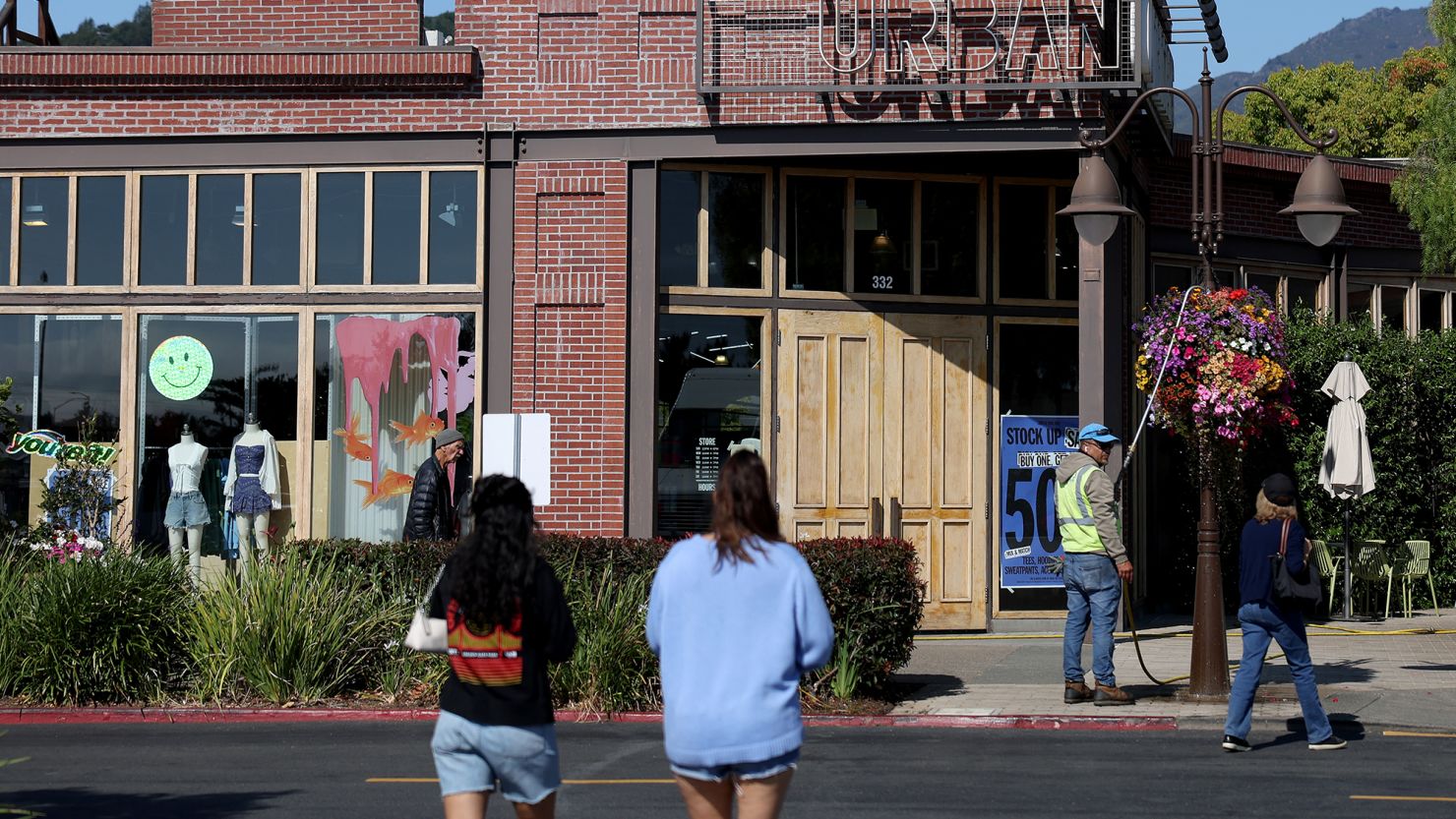 A sign is posted on the exterior of an Urban Outfitters store on August 09, 2024 in Corte Madera, California.