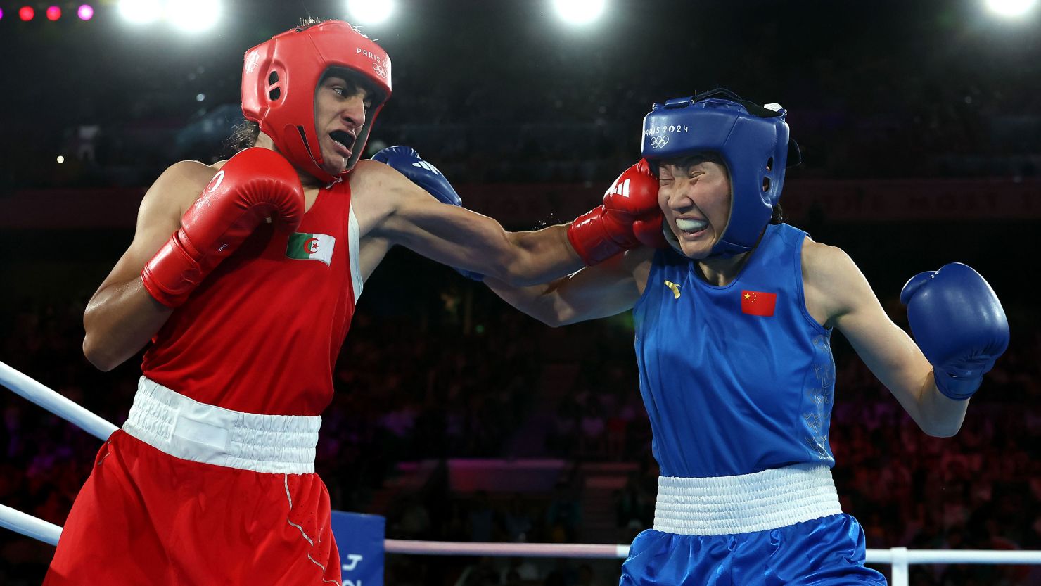 Imane Khelif (red) punches Yang Liu of China during the Women's 66kg boxing final.