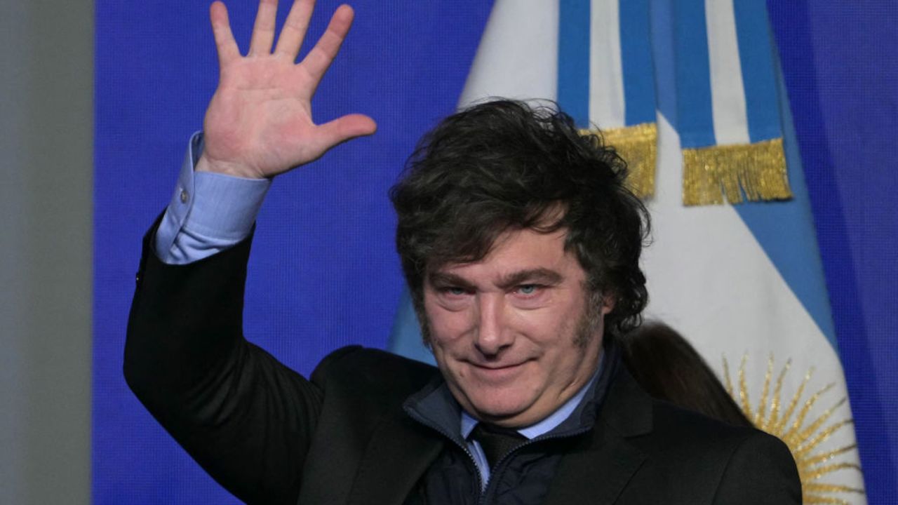 Argentine President Javier Milei waves after delivering a speech during the Americas Society/Council of the Americas conference in Buenos Aires on August 14, 2024. (Photo by Juan MABROMATA / AFP) (Photo by JUAN MABROMATA/AFP via Getty Images)