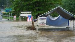 Flash flooding covers a roadway after Tropical Storm Ernesto moved through the area in Dorado, Puerto Rico on August 14, 2024. Ernesto grew into a hurricane Wednesday, US forecasters said, after leaving more than 600,000 customers without power in the US territory of Puerto Rico. (Photo by Jaydee Lee SERRANO / AFP) (Photo by JAYDEE LEE SERRANO/AFP via Getty Images)