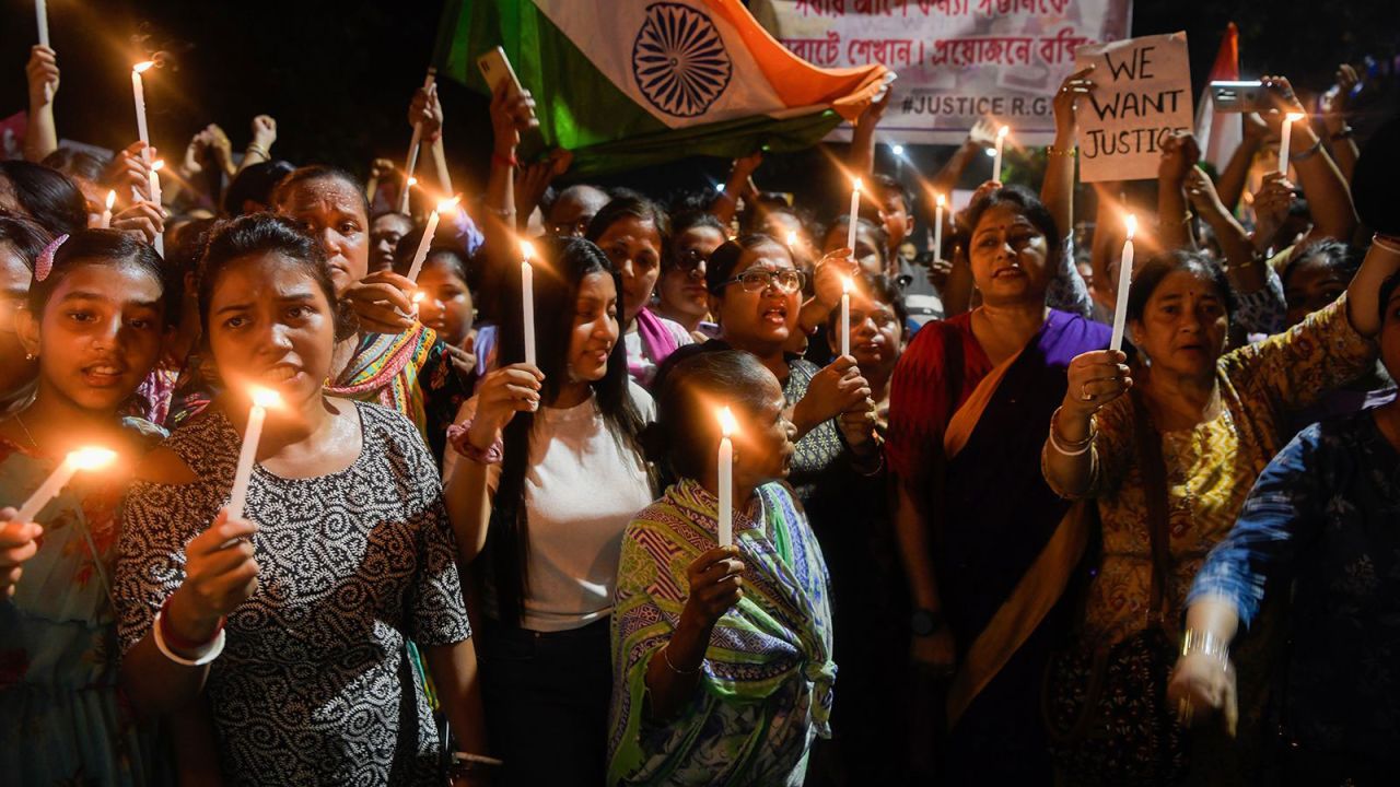Women hold lit candles as they take part in a vigil named "Reclaim the Night", in Kolkata, West Bengal, India on August 15, 2024.