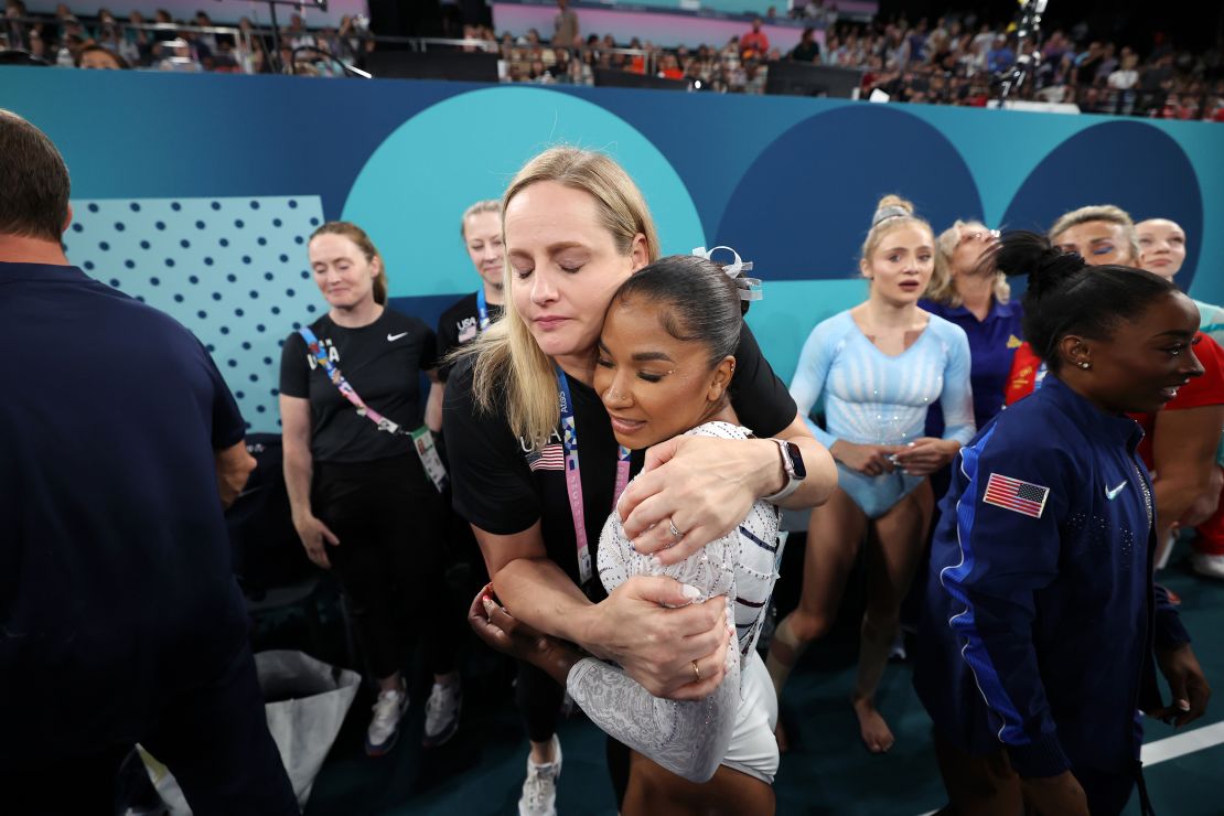 Jordan Chiles of Team USA hugs her coach Cecile Landi.