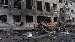 This photograph taken on 16 August, 2024, during a media tour organised by Ukraine, shows a destroyed vehicle next to a destroyed building in the Ukrainian-controlled Russian town of Sudzha, Kursk region, amid the Russian invasion in Ukraine.