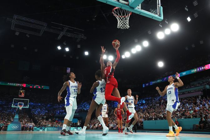 The United States' A'ja Wilson scores a basket during the gold-medal game against France on August 11. Wilson had 21 points, 13 rebounds and four blocks as <a href="https://www.cnn.com/sport/live-news/paris-olympics-news-closing-ceremony#h_f15b1c644d54dea53377454377abe6df">the Americans won 67-66</a>. It is Team USA's eighth straight gold in women's basketball.