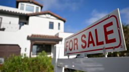 A for sale sign is displayed outside of a home for sale on August 16, 2024 in Los Angeles, California. United States real estate industry rules governing agent commissions will change on August 17 as part of a legal settlement between the National Association of Realtors and home sellers. (Photo by Patrick T. Fallon / AFP) (Photo by PATRICK T. FALLON/AFP via Getty Images)