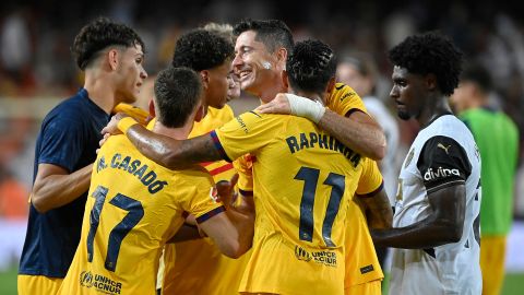 Barcelona's Robert Lewandowski, center, celebrates with teammates after the game.