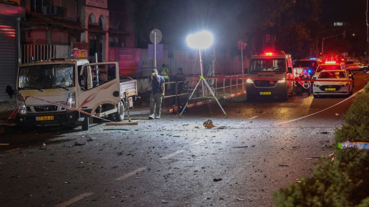 Israeli security and emergency personnel cordon off the site of an explosion in Tel Aviv on August 18, 2024. Palestinian groups Hamas and Islamic Jihad on August 19 claimed responsibility for a bombing in Tel Aviv, calling it a "suicide operation" and threatening more attacks in Israel as the Gaza war drags on. (Photo by Jack GUEZ / AFP) (Photo by JACK GUEZ/AFP via Getty Images)