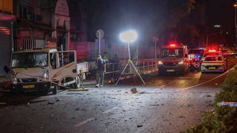 Israeli security and emergency personnel cordon off the site of an explosion in Tel Aviv on August 18, 2024.