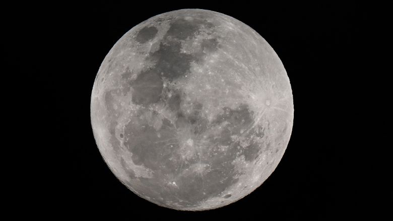 A rare blue supermoon appears in the night sky over Sydney on August 19, 2024. (Photo by Saeed KHAN / AFP) (Photo by SAEED KHAN/AFP via Getty Images)